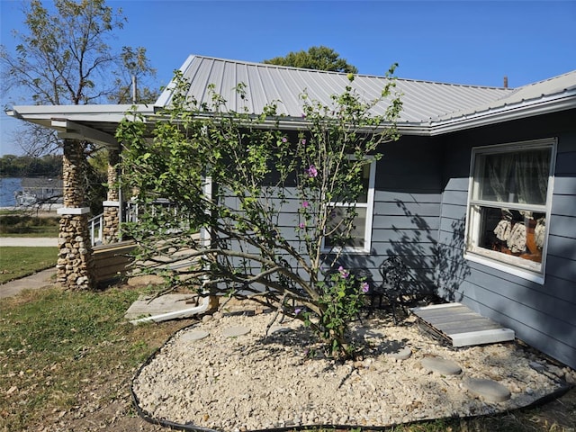 174 Clinton St, Hamburg, IL 62045 - view of property exterior featuring metal roof