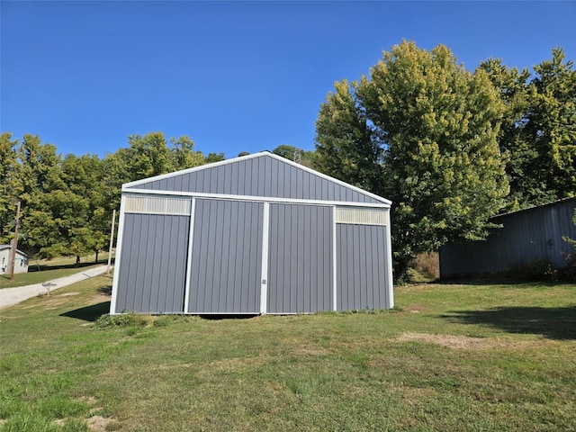 174 Clinton St, Hamburg, IL 62045 - view of pole building featuring a lawn