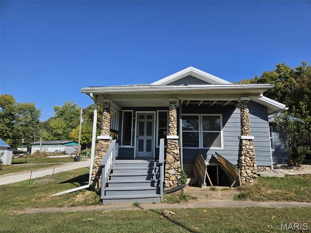 174 Clinton St, Hamburg, IL 62045 - view of front of home with covered porch and stone siding