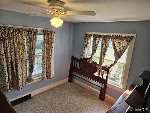 174 Clinton St, Hamburg, IL 62045 - carpeted bedroom with baseboards and ceiling fan