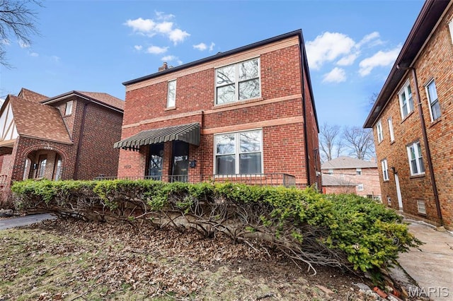 7273 Dartmouth Ave, Saint Louis, MO 63130 - view of front of home featuring brick siding