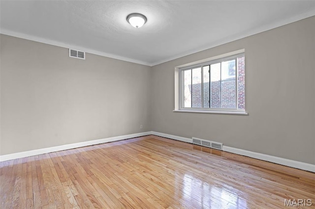 7273 Dartmouth Ave, Saint Louis, MO 63130 - empty room featuring wood-type flooring and baseboards