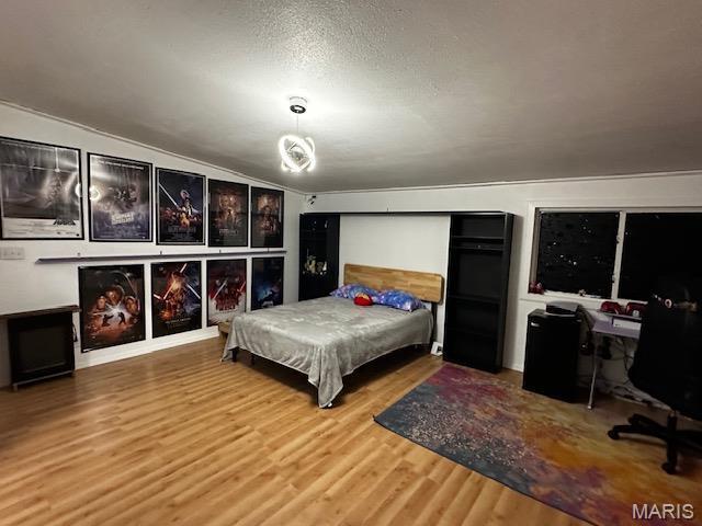 699 State Highway V, Sturdivant, MO 63782 - bedroom with wood finished floors and an office area