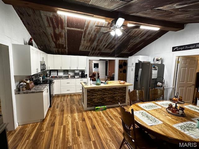 699 State Highway V, Sturdivant, MO 63782 - kitchen featuring electric stove, black microwave, fridge with ice dispenser, dark wood-style flooring, and ceiling fan