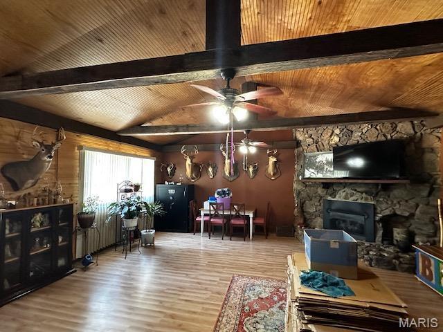 699 State Highway V, Sturdivant, MO 63782 - living area featuring wood ceiling, ceiling fan, wood finished floors, and a fireplace