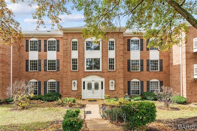 964 Claytonbrook Dr Unit 2A, Ballwin, MO 63011 - colonial inspired home featuring brick siding