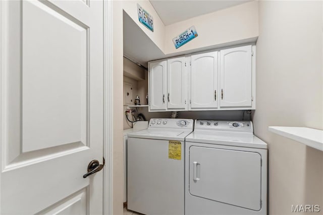 964 Claytonbrook Dr Unit 2A, Ballwin, MO 63011 - laundry room with washing machine and dryer and cabinet space