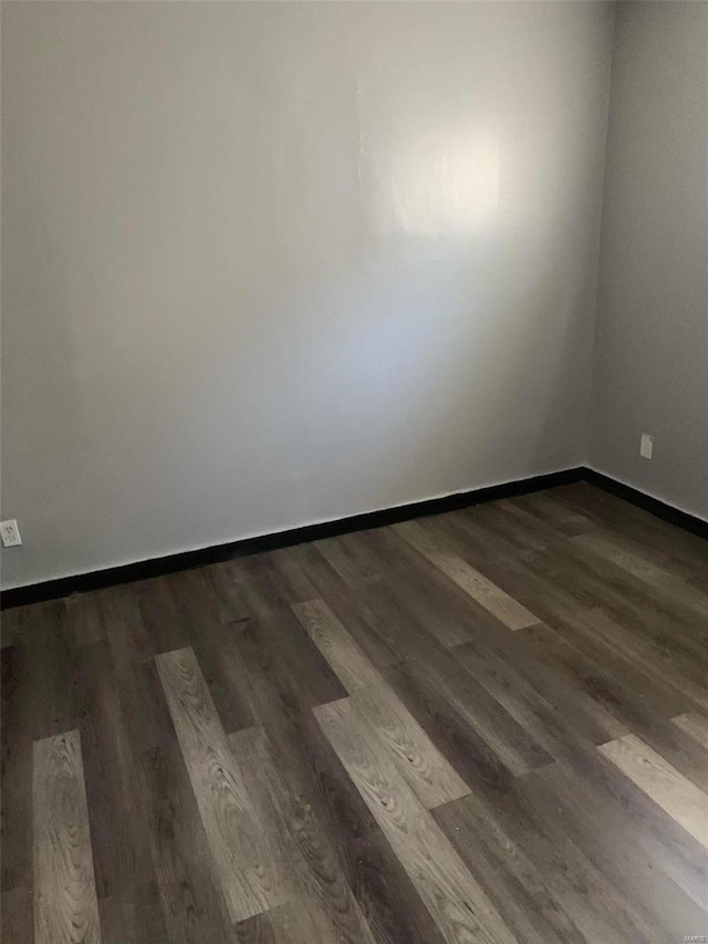 11821 Larimore Rd, Saint Louis, MO 63138 - spare room with wood finished floors and baseboards