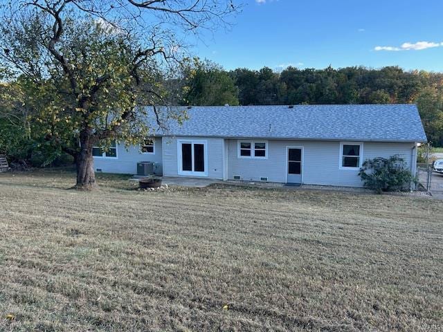 13825 Old Wire Outer Rd, Rolla, MO 65401 - rear view of house featuring a yard, central AC, and a patio area