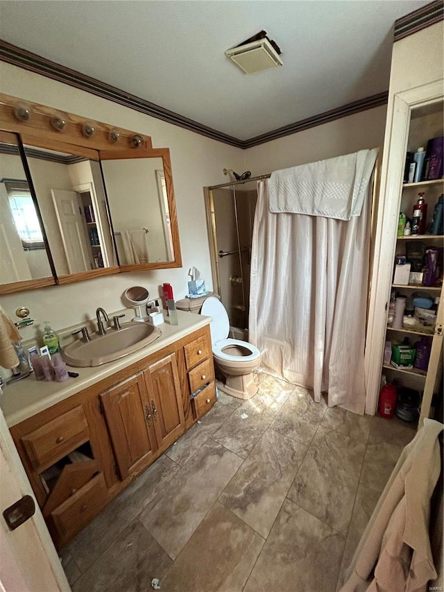bathroom featuring ornamental molding, a shower with curtain, toilet, and vanity
