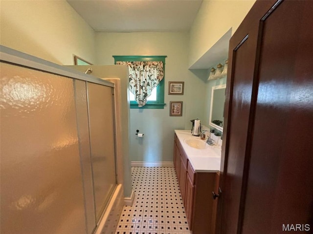 203 W Booneslick Rd, Warrenton, MO 63383 - full bath featuring vanity, a shower stall, baseboards, and tile patterned floors