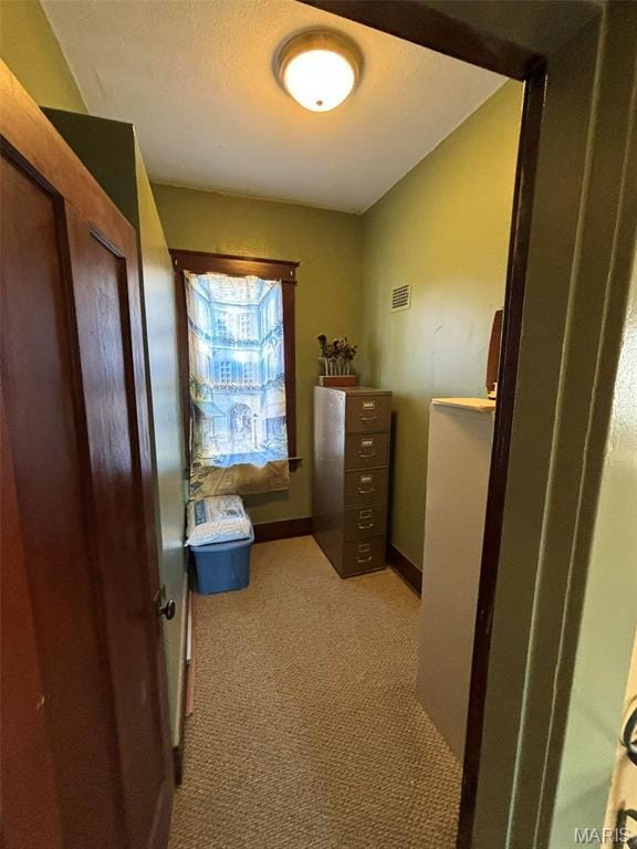 203 W Booneslick Rd, Warrenton, MO 63383 - hall featuring light colored carpet and baseboards