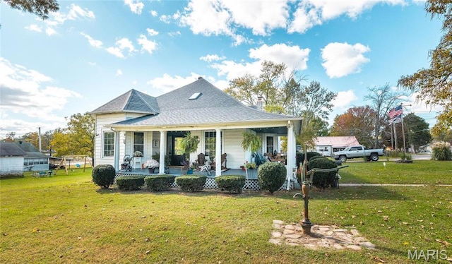401 W Gibbs, Salem, MO 65560 - view of front of property with a front yard, covered porch, a chimney, and roof with shingles