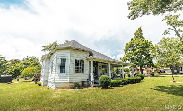 401 W Gibbs, Salem, MO 65560 - view of side of property with a lawn and covered porch