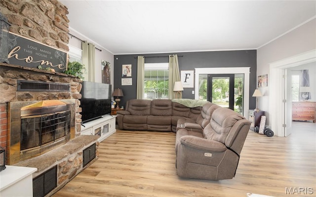 401 W Gibbs, Salem, MO 65560 - living area with ornamental molding, wood finished floors, and a fireplace