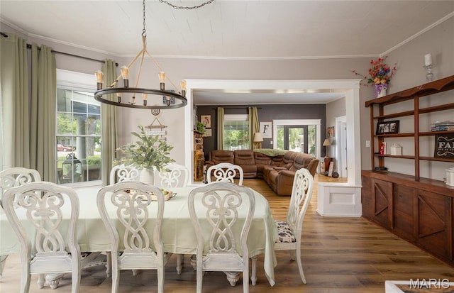 401 W Gibbs, Salem, MO 65560 - dining space with a chandelier, wood finished floors, and ornamental molding