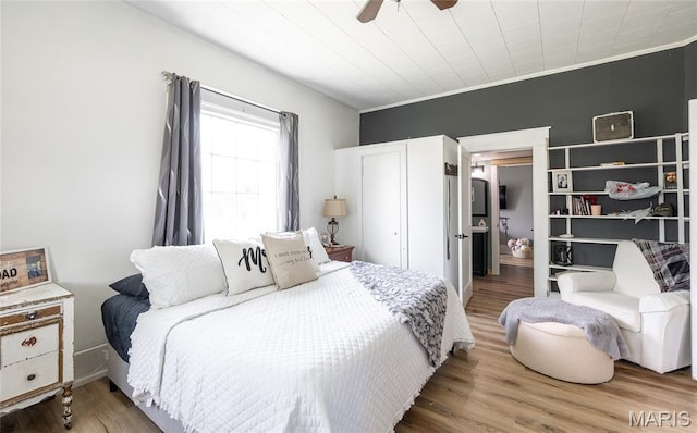401 W Gibbs, Salem, MO 65560 - bedroom with wood finished floors and ceiling fan