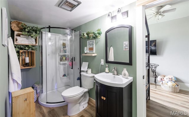 401 W Gibbs, Salem, MO 65560 - full bath with a shower stall, vanity, wood finished floors, and ceiling fan