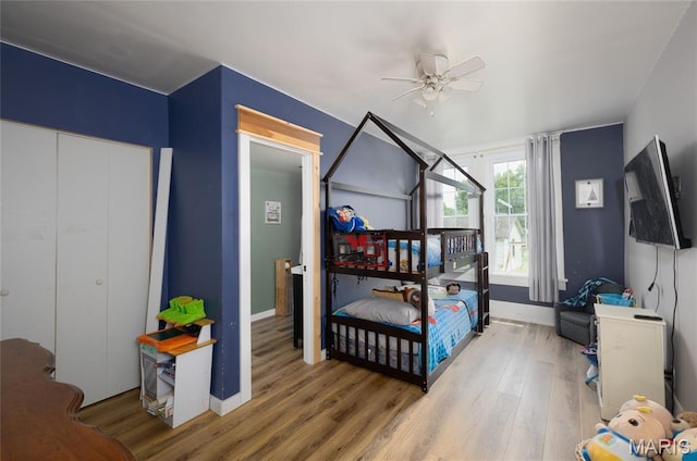 401 W Gibbs, Salem, MO 65560 - bedroom with wood finished floors and ceiling fan