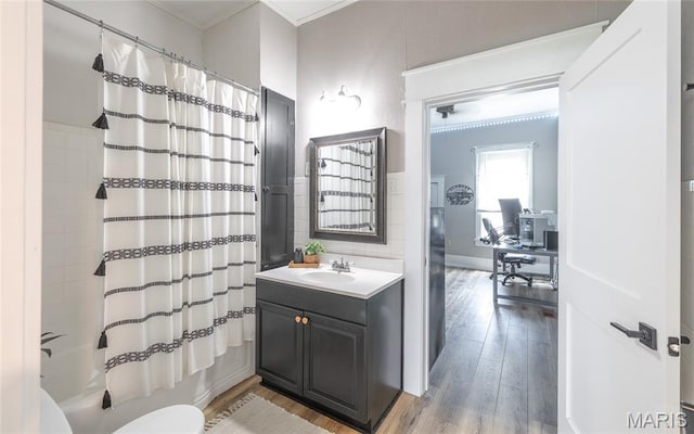 401 W Gibbs, Salem, MO 65560 - full bathroom with vanity, wood finished floors, shower / bath combination with curtain, and crown molding