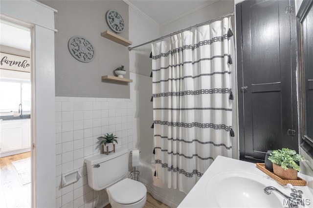 401 W Gibbs, Salem, MO 65560 - full bathroom featuring tile walls, ornamental molding, shower / bath combination with curtain, and wood finished floors