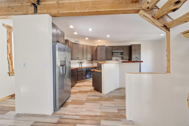 11336 Choctaw Cir, Saint Genevieve, MO 63670 - kitchen featuring stainless steel fridge with ice dispenser, recessed lighting, light wood finished floors, light countertops, and dark brown cabinets