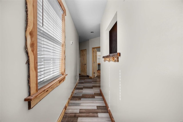 11336 Choctaw Cir, Saint Genevieve, MO 63670 - corridor featuring wood finished floors and baseboards
