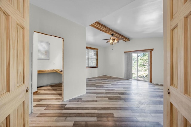 11336 Choctaw Cir, Saint Genevieve, MO 63670 - empty room with light wood-type flooring, a ceiling fan, and beam ceiling