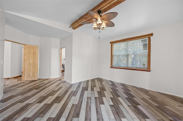 11336 Choctaw Cir, Saint Genevieve, MO 63670 - spare room with wood finished floors, beamed ceiling, and ceiling fan