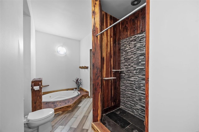 11336 Choctaw Cir, Saint Genevieve, MO 63670 - full bathroom featuring a bath, a shower, toilet, and wood finished floors