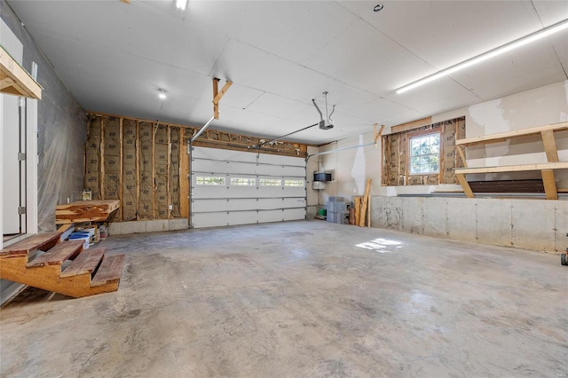 11336 Choctaw Cir, Saint Genevieve, MO 63670 - garage featuring a garage door opener