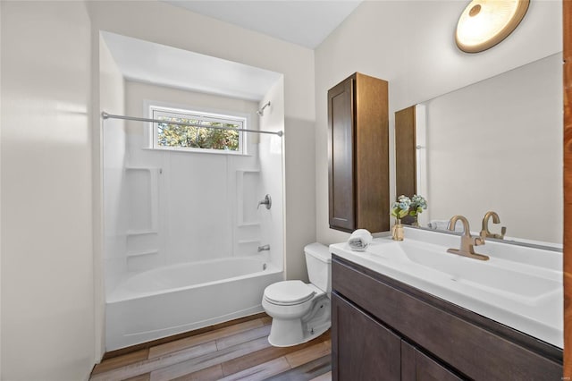 11336 Choctaw Cir, Saint Genevieve, MO 63670 - full bath with wood finished floors, toilet, shower / bathtub combination, and vanity