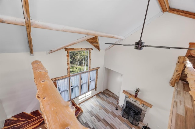 11336 Choctaw Cir, Saint Genevieve, MO 63670 - living room with wood finished floors, a fireplace, and a ceiling fan
