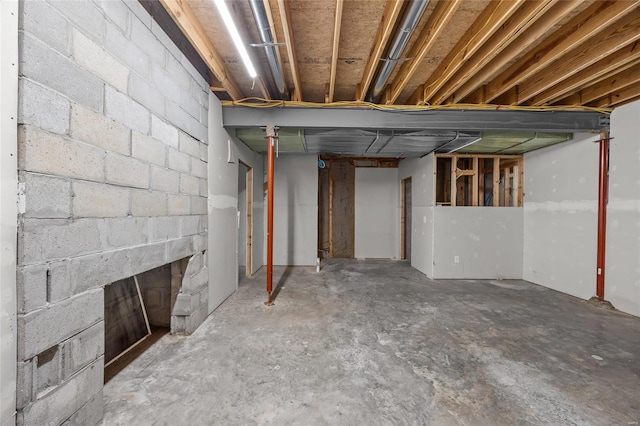 11336 Choctaw Cir, Saint Genevieve, MO 63670 - unfinished basement featuring a brick fireplace