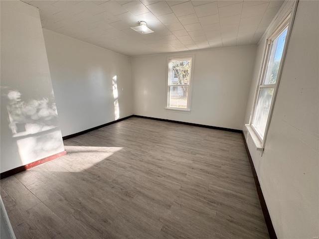 305 S Main St, Center, MO 63436 - unfurnished room with wood finished floors and baseboards