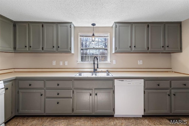 32 Summit St, Bonne Terre, MO 63628 - kitchen with white dishwasher, a sink, gray cabinets, a textured ceiling, and light countertops