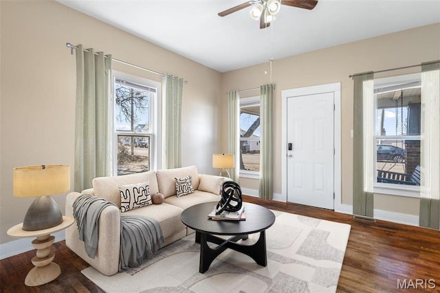 32 Summit St, Bonne Terre, MO 63628 - living room featuring wood finished floors, baseboards, and a ceiling fan