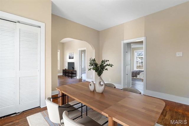 32 Summit St, Bonne Terre, MO 63628 - dining space with arched walkways, wood finished floors, and baseboards