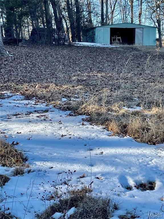 3159 Dorman Rd, Festus, MO 63028 - view of yard with an outdoor structure and a carport