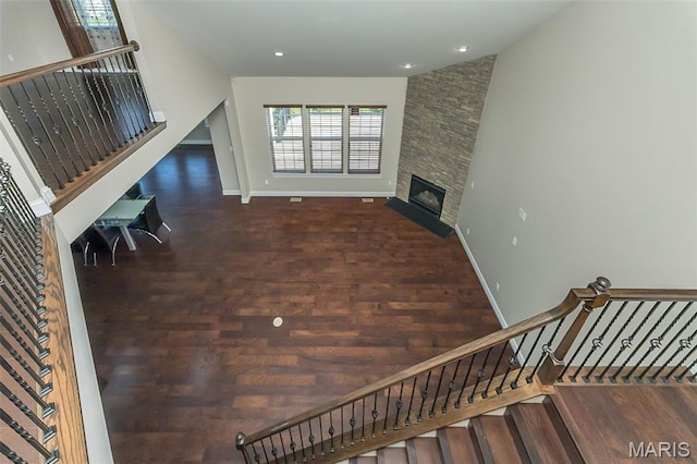 612 Savannah View Way, Chesterfield, MO 63017 - stairway with wood finished floors, baseboards, and a fireplace