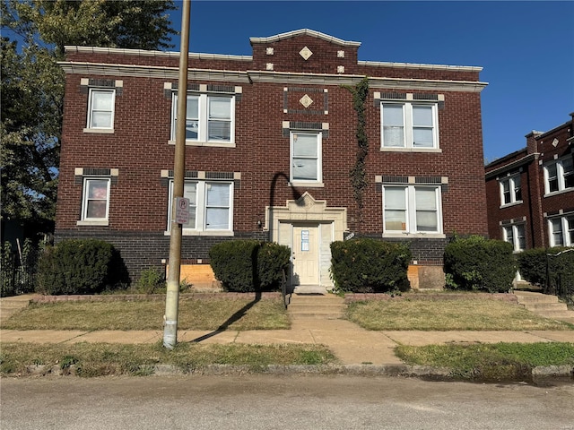 multi unit property featuring brick siding
