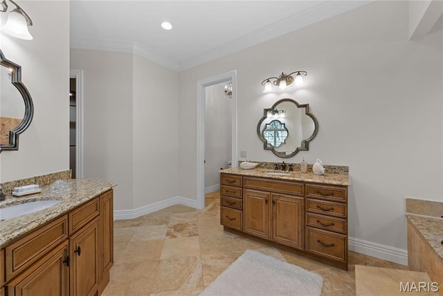 1 Claychester Dr, Saint Louis, MO 63131 - full bath featuring two vanities, crown molding, baseboards, and recessed lighting