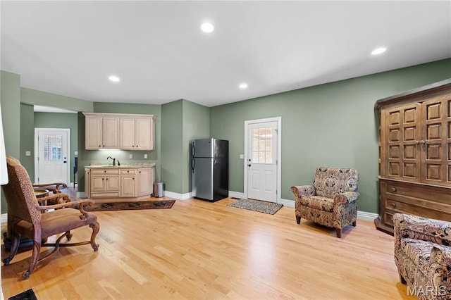 1 Claychester Dr, Saint Louis, MO 63131 - living room featuring light wood finished floors, baseboards, and recessed lighting