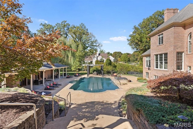 1 Claychester Dr, Saint Louis, MO 63131 - swimming pool featuring a patio