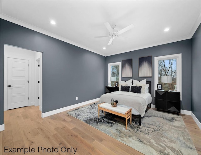 bedroom featuring crown molding, baseboards, light wood-style flooring, recessed lighting, and ceiling fan