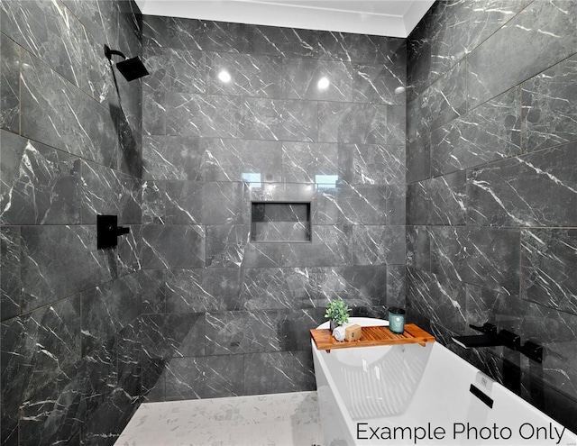 bathroom featuring a tile shower, a soaking tub, and tile walls