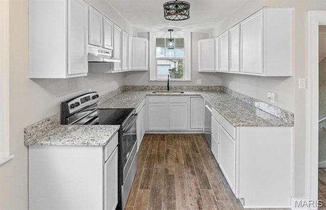 kitchen with stainless steel range with electric cooktop, a sink, under cabinet range hood, dark wood-style floors, and white cabinetry