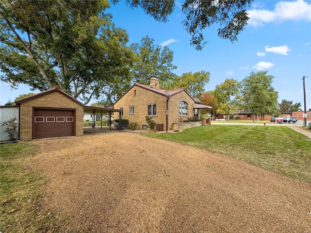13 N Jackson St, Millstadt, IL 62260 - view of front of property featuring dirt driveway, brick siding, a chimney, a front yard, and central AC unit