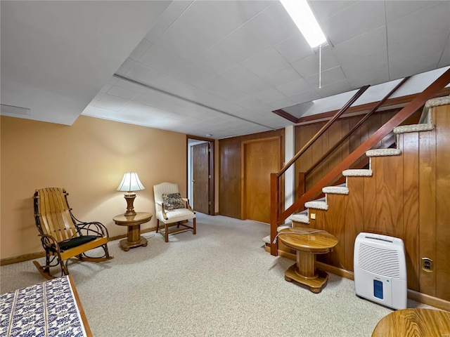 13 N Jackson St, Millstadt, IL 62260 - finished below grade area featuring light carpet, stairs, and baseboards