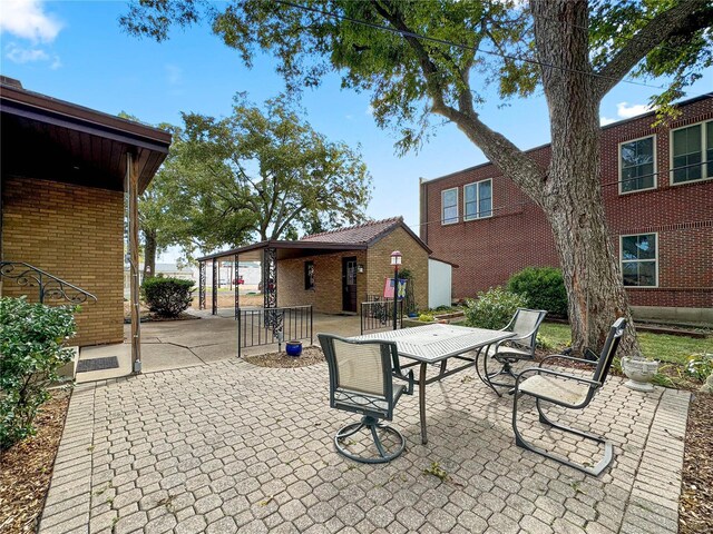 13 N Jackson St, Millstadt, IL 62260 - view of patio featuring outdoor dining space